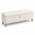 Banc de rangement en tissu bouclé beige avec pieds en bois